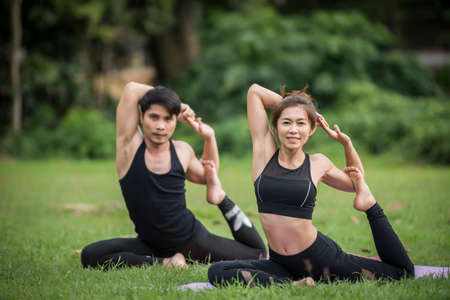Yoga action exercise healthy in the parkの写真素材