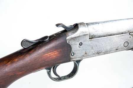 Gun in hand on white isolate background