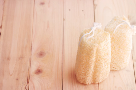 shower equipment made from fiber of zucchini on wood pallet backgroundの写真素材