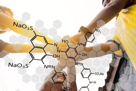 harmonious hand of team work under warm lightの写真素材