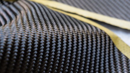 Black carbon fiber composite material backgroundの写真素材