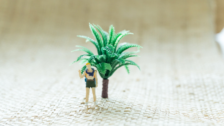 figurine travel man on the screen backgroundの写真素材