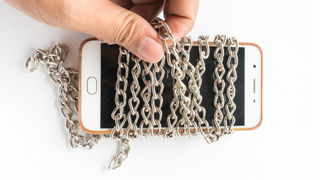 mobile smart phone lock by chain for protect dataの写真素材