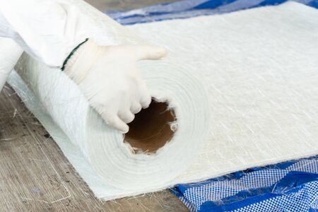 glass fiber material prepare for lining coating repair. scrub waste water tank repairの写真素材