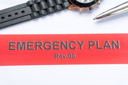 emergency plan book with paper and penの写真素材