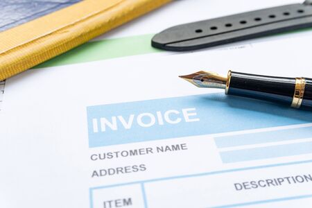Invoice business document  close up with pen backgroundの写真素材