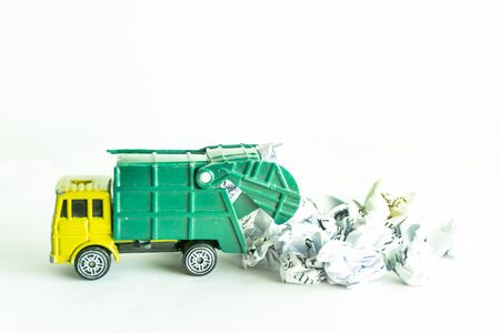 Garbage collection truck car for clean paper waste on white floorの写真素材