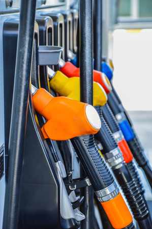Horizontal shot of some fuel pumps at a gas stationの写真素材