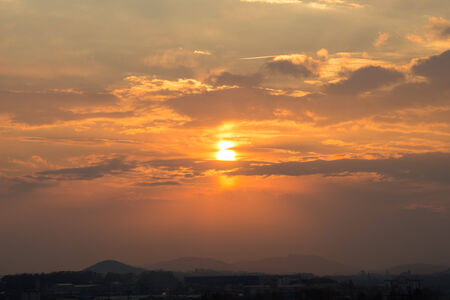 Fiery orange sunset skyの写真素材