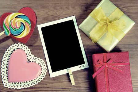Valentines background with candy and gift with vintage colour.