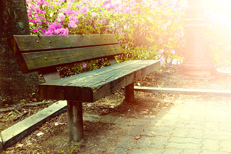 Wooden bench in park with vintage color.の写真素材