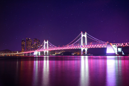 Gwangan Bridge at night with star in Busan, South Korea.の写真素材
