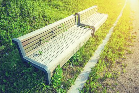 Wooden bench in park with vintage color.の写真素材