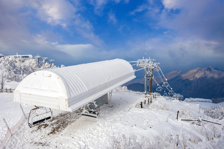 Ski chair lift is covered by snow in winter,Deogyusan mountains in South Korea.の写真素材
