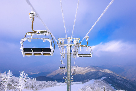 Ski chair lift is covered by snow in winter, Korea.の写真素材