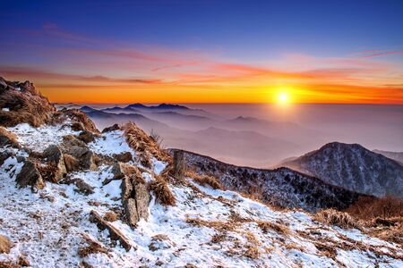 Winter landscape with sunset and foggy in Deogyusan mountains, South Korea.の写真素材
