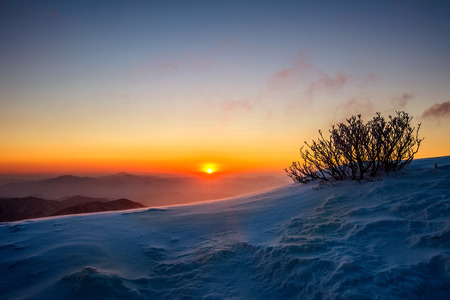 Sunrise on Deogyusan mountains covered with snow in winter,South Korea.の写真素材