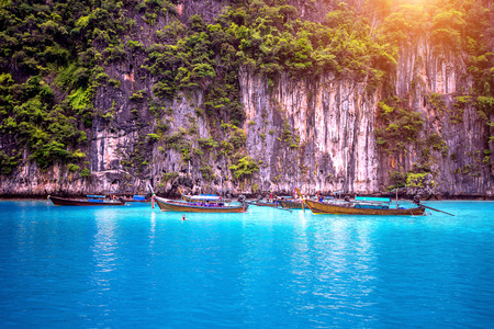 Long boat and blue water at Maya bay in Phi Phi Island, Krabi Thailand.の写真素材