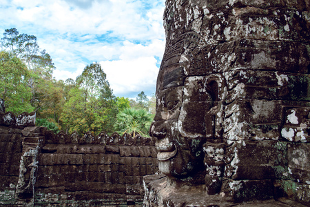 Buddhist faces Bayon Temple, Angkor wat in Cambodia.の写真素材