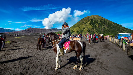 Java,Indonesia-Arpil 24,2017 : A horseman at Mount Bromo of Bromo-Tengger-Semeru National Park in Indonesia.のeditorial素材