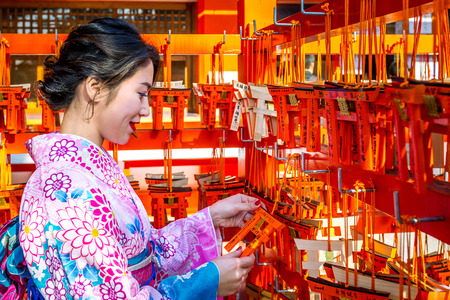 Kyoto,Japan- 17 November 2017: Women in traditional japanese kimonos at Fushimi Inari Shrine in Kyoto, Japanのeditorial素材