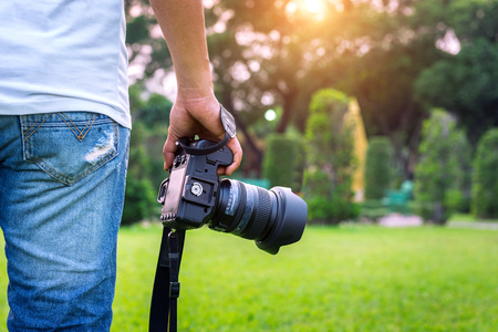 Photographer holding camera.の写真素材