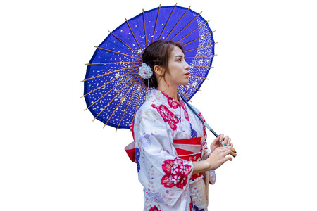 Asian woman wearing japanese traditional kimono with umbrella on white background.の写真素材
