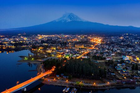 Fuji mountains and Fujikawaguchiko city at night, Japan.の写真素材