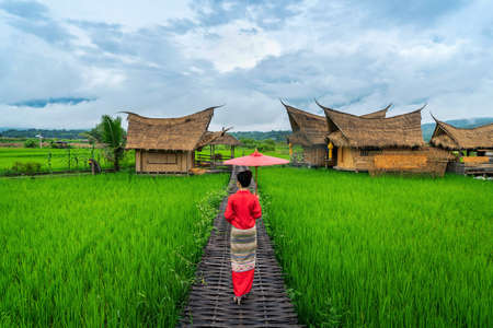 Asian women wearing Thai dress costume traditional according Thai culture at famous place in Nan province, Thailand.の写真素材