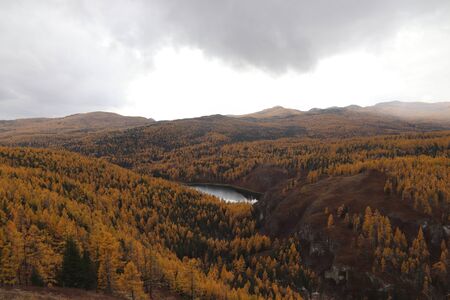 The autumn landscape in Altai mountains - Uchkel Lake on the Ulagan Plateau, Altai Republic, Russia
