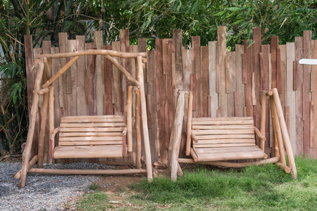wood swing in the gardenの写真素材
