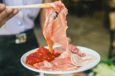 shabu-shabu, thin slices of beef parboiled in hot soupの写真素材