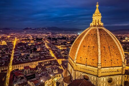 Beautiful panoramic view of Florence City and Duomo cupola at duskの写真素材