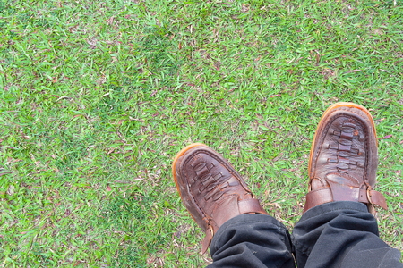 brown boots  and  black pants.の写真素材