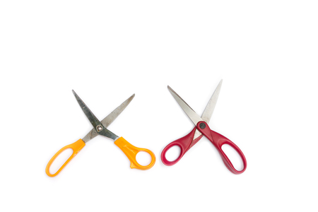 Yellow and Red Scissors isolated on a white background.