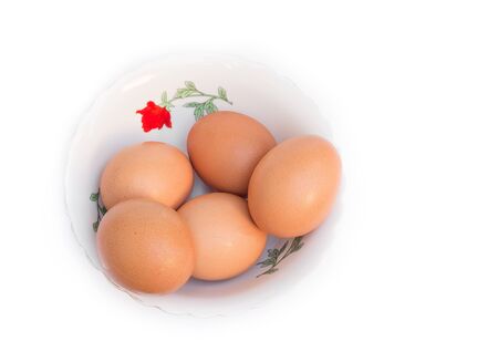 five eggs in Cup. Isolated on white backgroundの写真素材