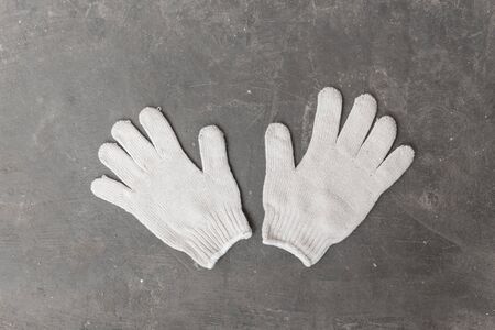 Gloves made of white, fabric for use in industrial applications.の写真素材