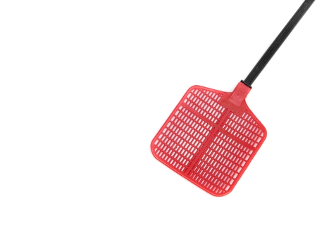 Red fly swatter. Single red flyswatter with reflections. Object made of plastic, very efficient and unfailing tool in catching flies.の写真素材