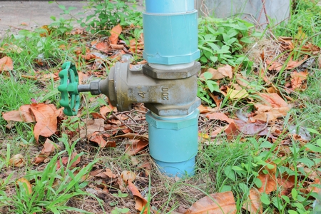 Water valve Plumbing Steel on grass. industrial tap water pipe. :Close-up, Select focus Water valve ...