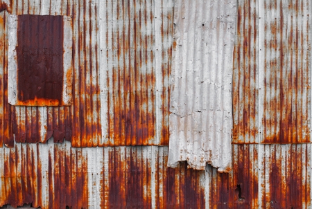 Zinc wall pattern. Rusty corrugated metal wall texture.  Zinc wall Old decay naturally: space for...