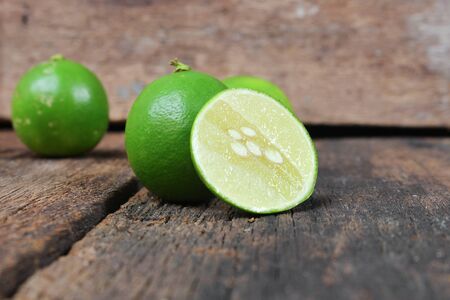 slice lemon closeup Select focus with shallow depth of field on the wooden tableの写真素材