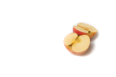 Cut red apple on white background, top viewの写真素材
