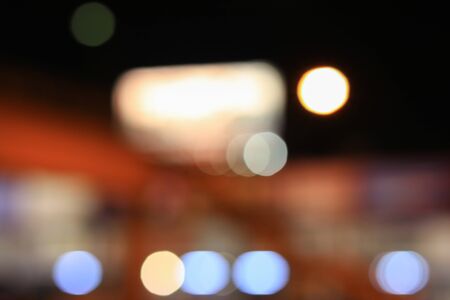 Abstract blurred bokeh in city night  colorful beautiful of traffic in Bangkok Thailand, with copy...