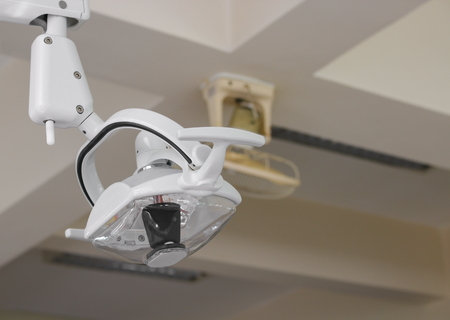 Lamp medical equipment Select focus with shallow depth of field in the dental clinicの写真素材