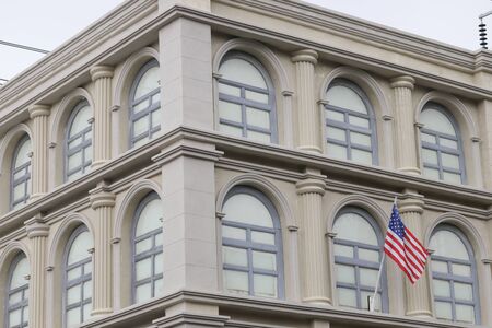 American flag on building, the  proudly displaying their