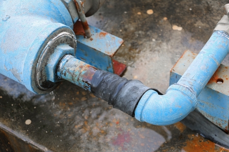 plumbing tube and  water leak, steel rust industrial old tap pipeの写真素材