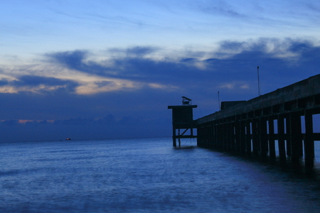 sunset landscape twilight time beautiful at bridge harbor and sea in evening for background with copy space.の写真素材
