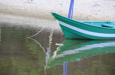 boat and beautiful beach in seaの写真素材