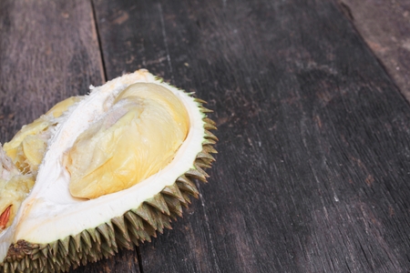 durian peeled ripe close up, King of fruit Thailand on the wooden table floorの写真素材