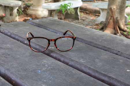 glasses on  wooden tableの写真素材